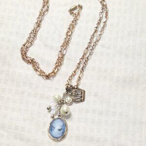 Silver charm necklace with cameo